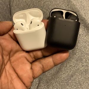 Apple AirPods black ones custom made. I paid $275 for them and white ones.